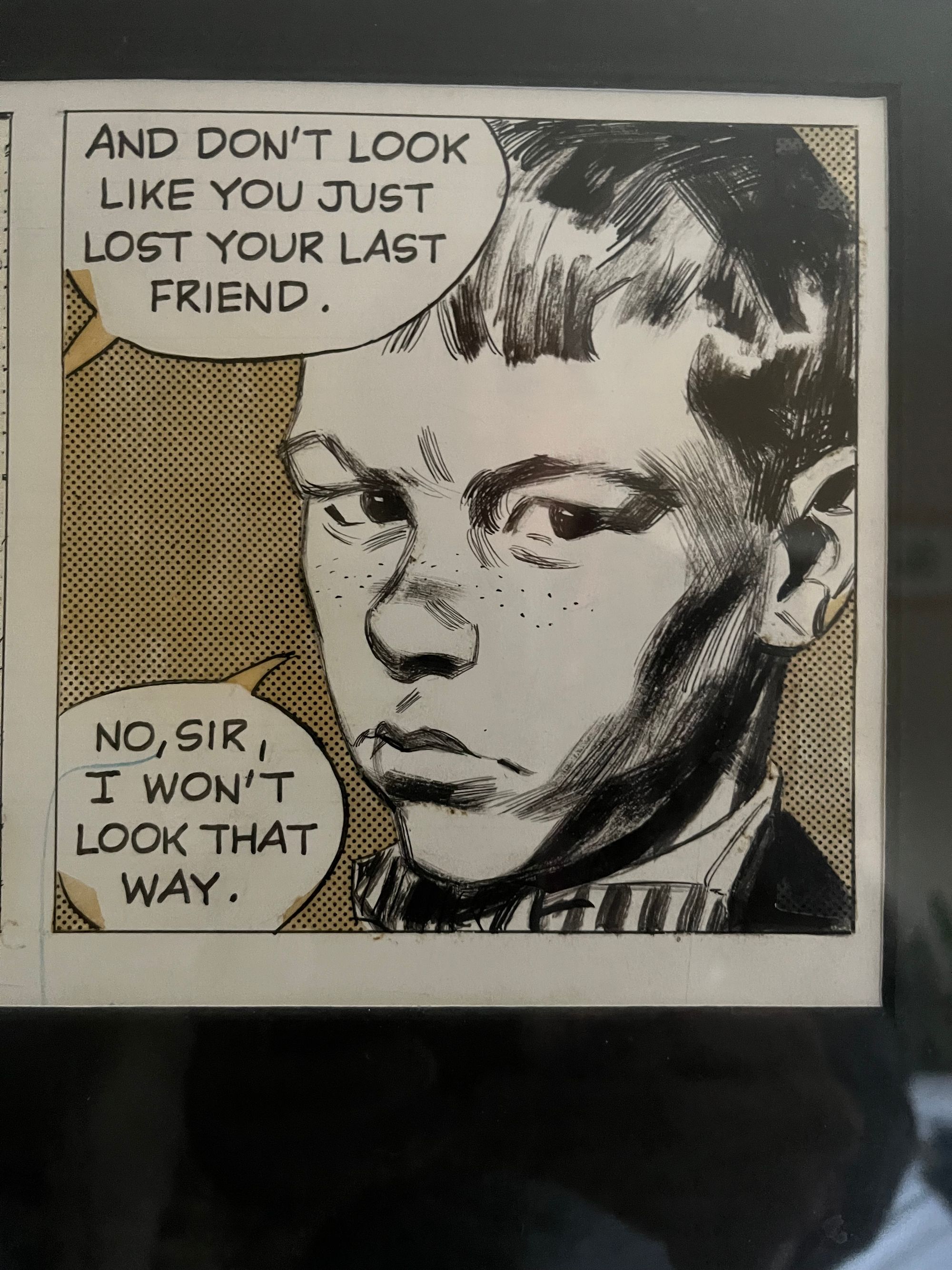 A comic panel with a young boy looking stern and sad. A text bubble coming from out-of-frame says “And don’t look like you just lost your best friend.” The boy replies, “No, sir, I won’t look that way.”  