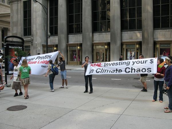 Protesters Pressure Cargill CEO and College Trustee to Extend Rainforest Protections